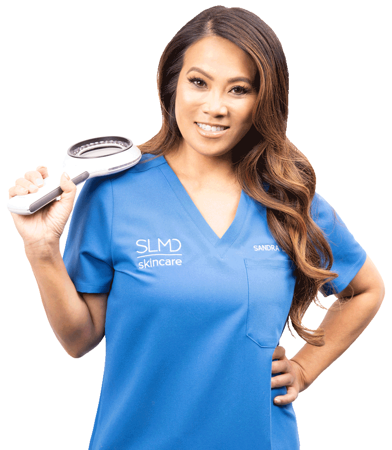 Dr. Sandra Lee aka Dr. Pimple Popper holding a medical magnifying glass